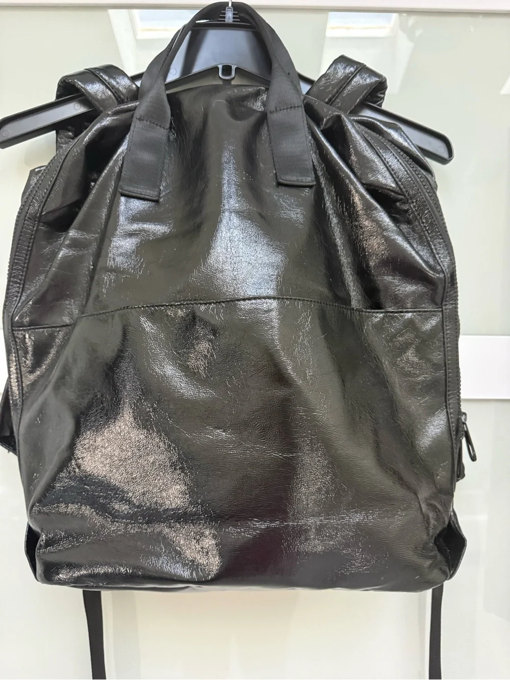 Sleek Shiny Black Leather Backpack